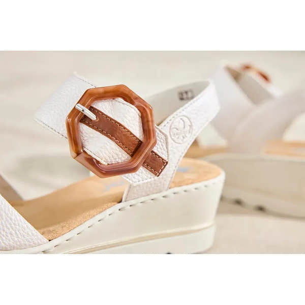 Rieker 67476-91 women's off-white touch fastening sandals with decorative buckle and wedge sole.