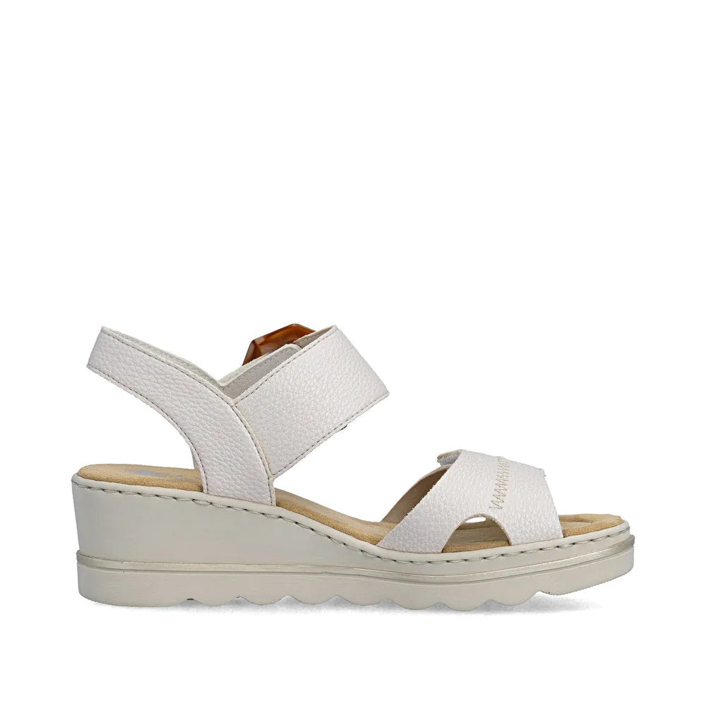 Rieker 67476-91 women's off-white touch fastening sandal with chunky wedge sole and adjustable straps.