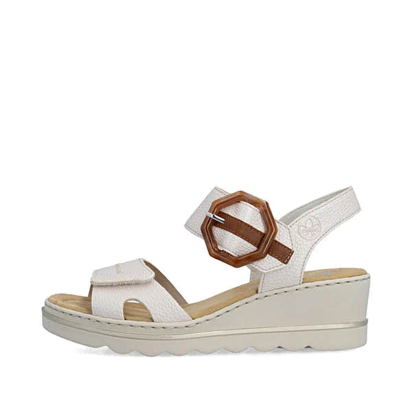 Rieker 67476-91 women's off-white touch-fastening sandals with buckle strap and wedge sole.