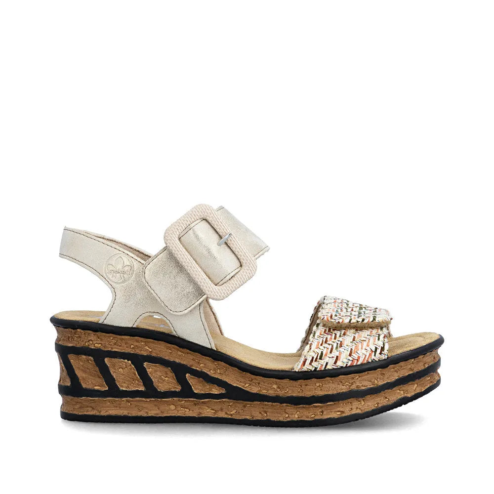 Rieker 68172-60 women's beige touch fastening wedge sandals with woven fabric straps and cork platform sole.
