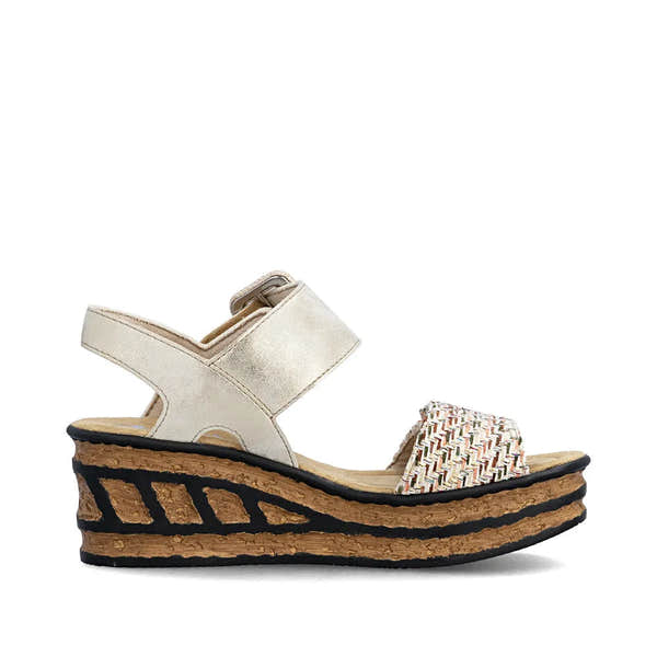 Rieker 68172-60 women's beige touch fastening wedge sandals with woven front strap and layered cork sole.