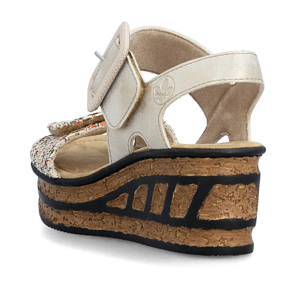 Rieker 68172-60 beige women's touch fastening sandals with platform cork sole and multicolor woven strap accents.
