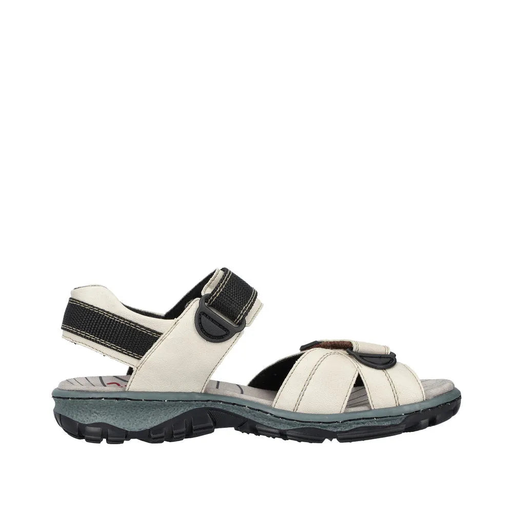 Rieker 68851-80 women's ivory touch-fastening sandals with adjustable straps and rugged outsole.