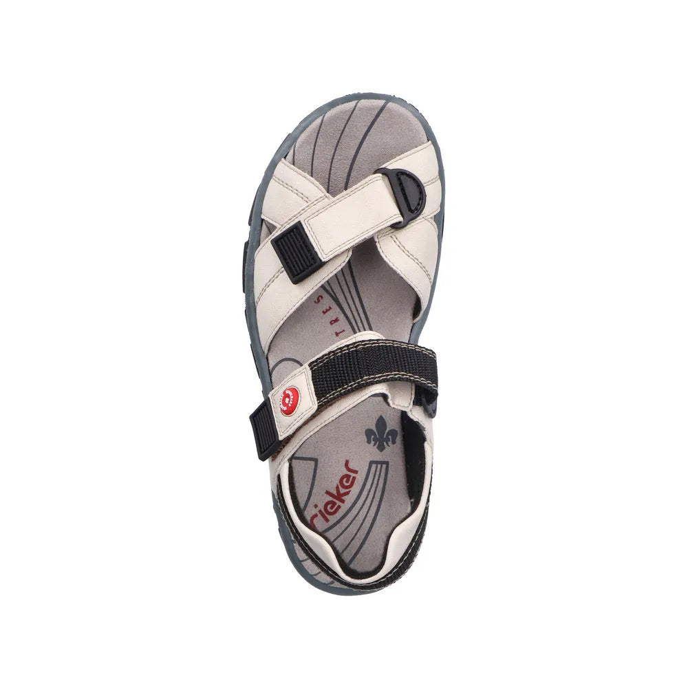 Rieker 68851-80 women's ivory touch fastening sandal with adjustable straps and open toe design.