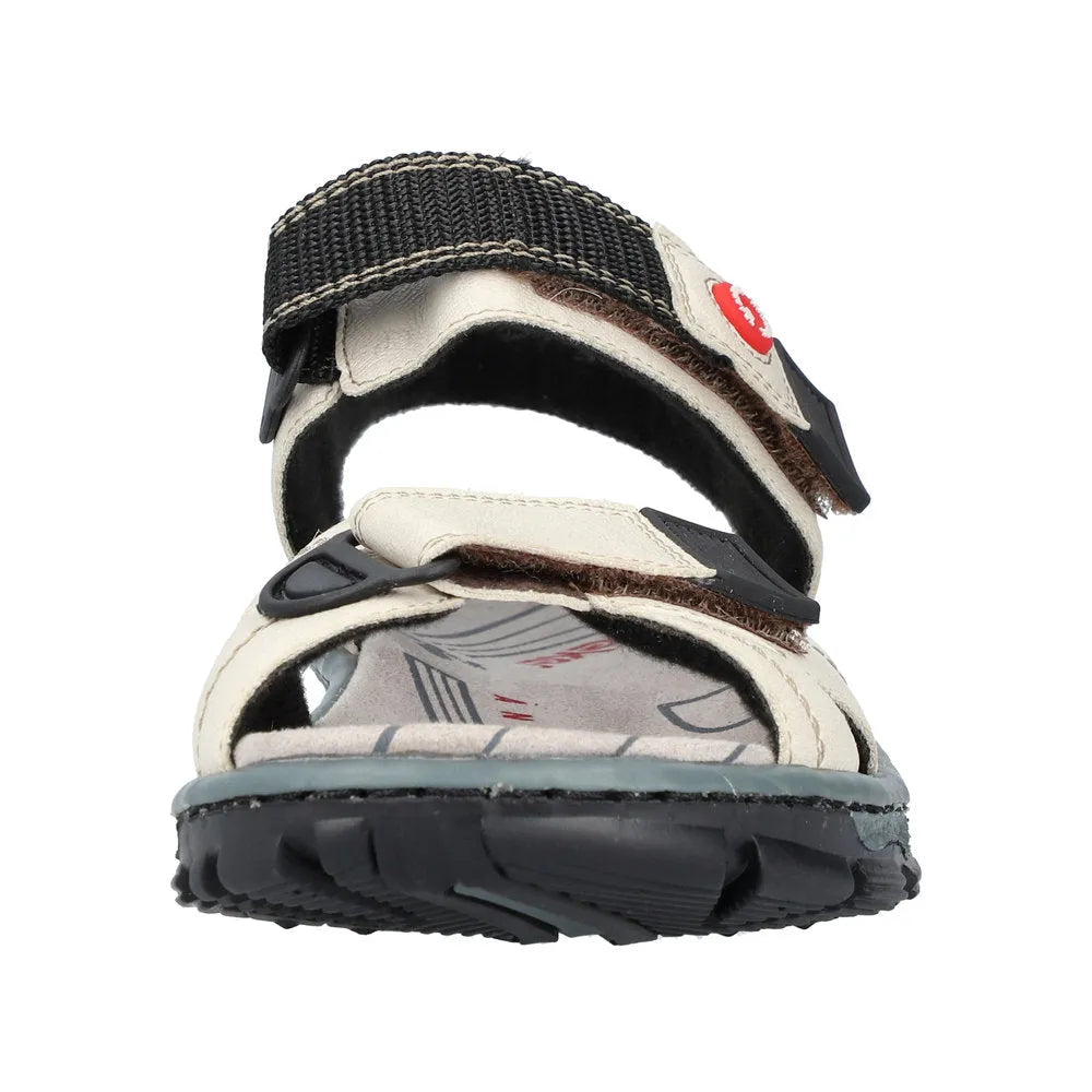 Rieker 68851-80 women's ivory touch fastening sandals with crisscross straps and black textured ankle strap.