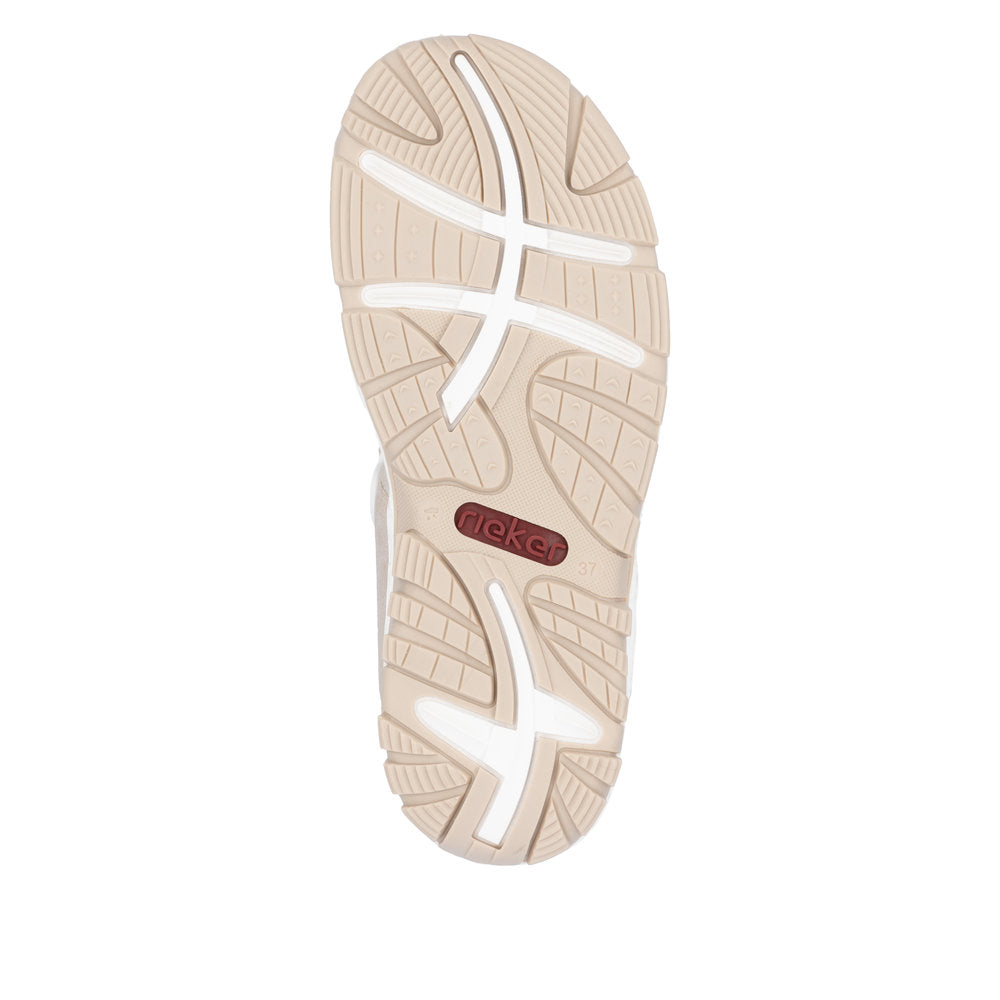 Rieker 68866-31 pink touch fastening sandal sole with beige and white accents, cushioned comfort, and sporty design.