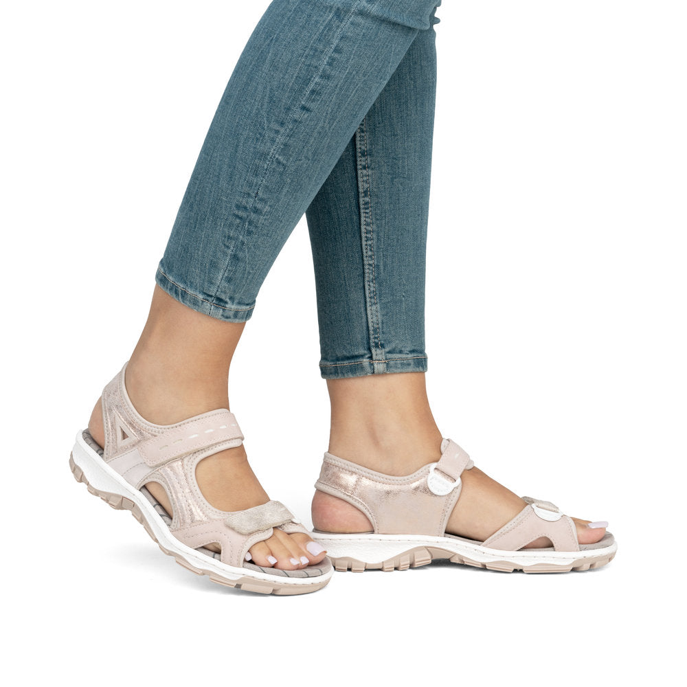 Rieker 68866-31 pink touch fastening sandals with adjustable straps and cushioned soles, perfect for casual summer wear.