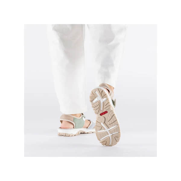 Rieker 68866-94 women's multi-touch fastening sandals with beige and green straps, cushioned soles, and textured rubber outsoles.