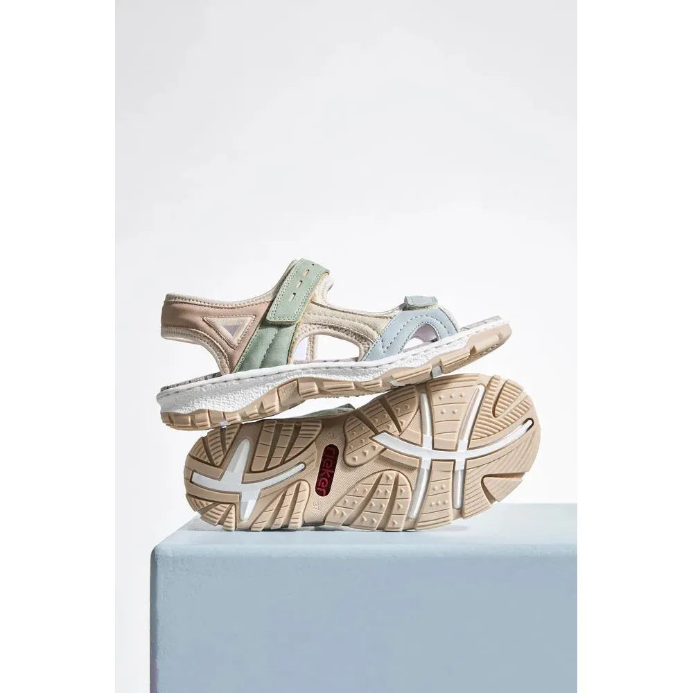 Rieker 68866-94 women's multi-touch fastening sporty sandals with cushioned sole and pastel-colored straps, beige and light blue accents.