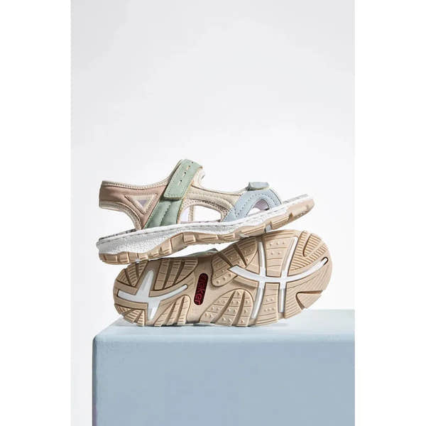 Rieker 68866-94 women's multi-touch fastening sporty sandals with cushioned sole and pastel-colored straps, beige and light blue accents.