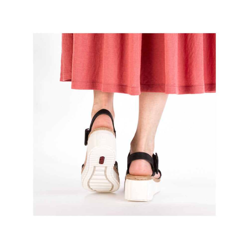 Rieker 69176-00 women's black buckle sandals with platform sole, open toe, and ankle strap, stylish and comfortable footwear.