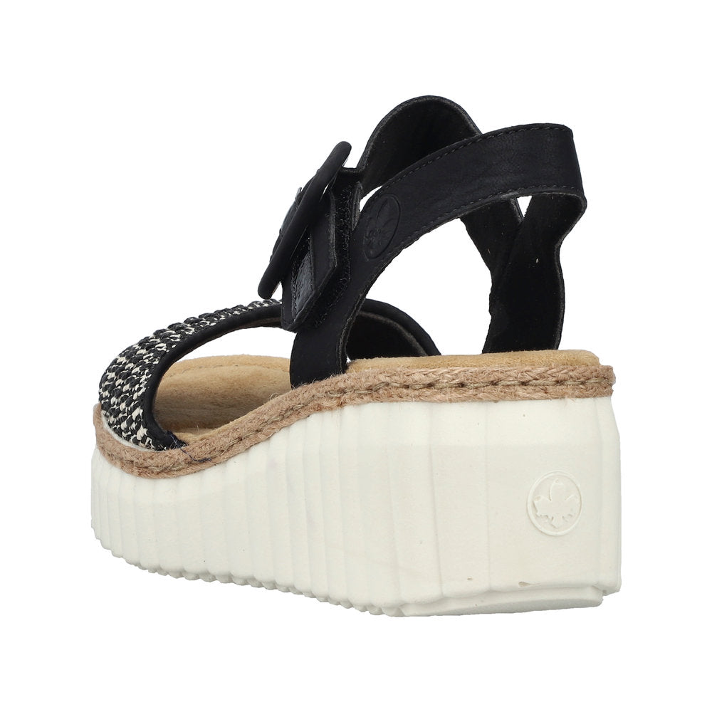 Rieker 69176-00 women's black buckle sandal with textured strap, platform sole, and espadrille-style trim.