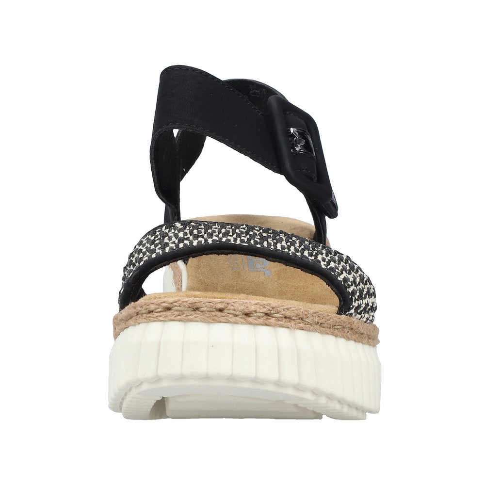 Rieker 69176-00 women's black buckle sandals with patterned straps and chunky sole.