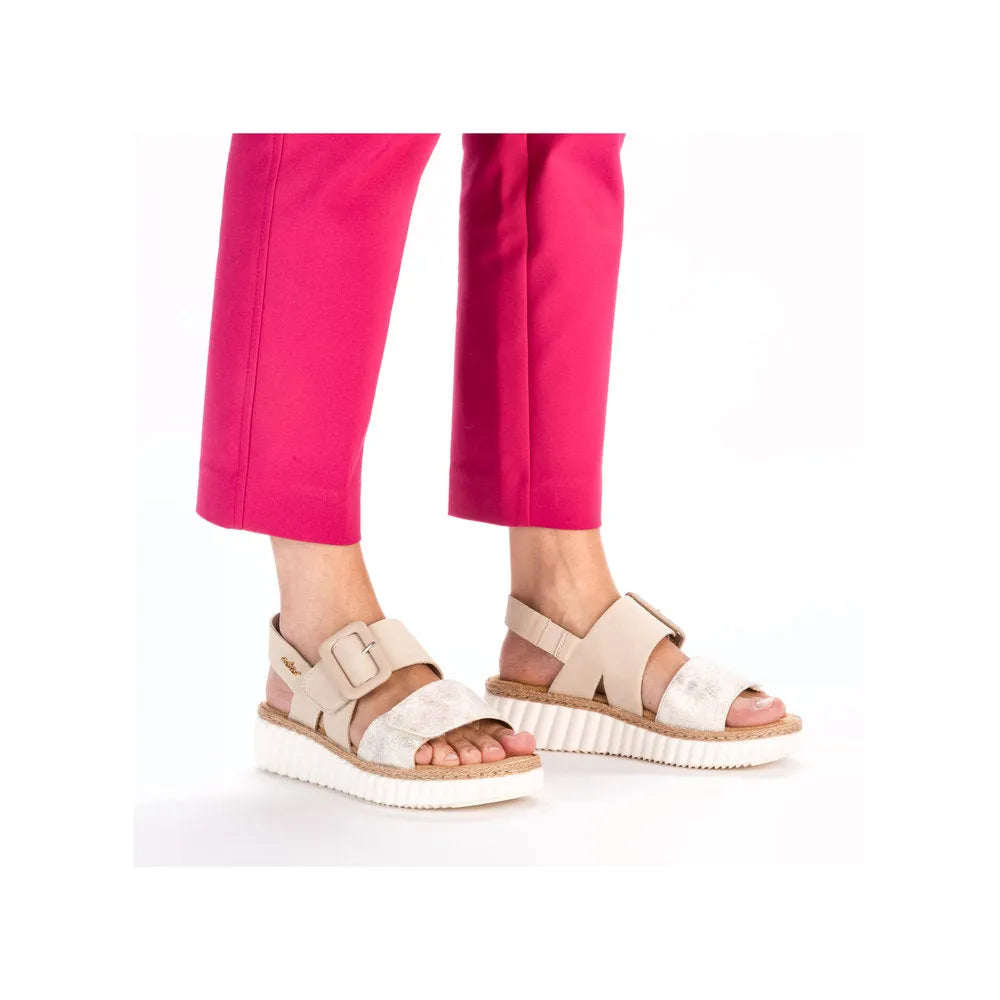 Rieker 69260-60 women's wide beige-gold touch fastening sandals with chunky white soles and adjustable strap.