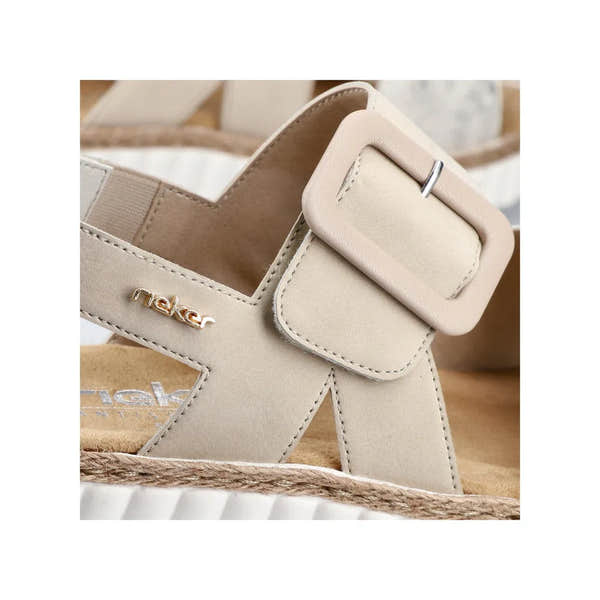 Rieker 69260-60 beige wide-fit slip-on sandals with touch fastenings and gold accents.
