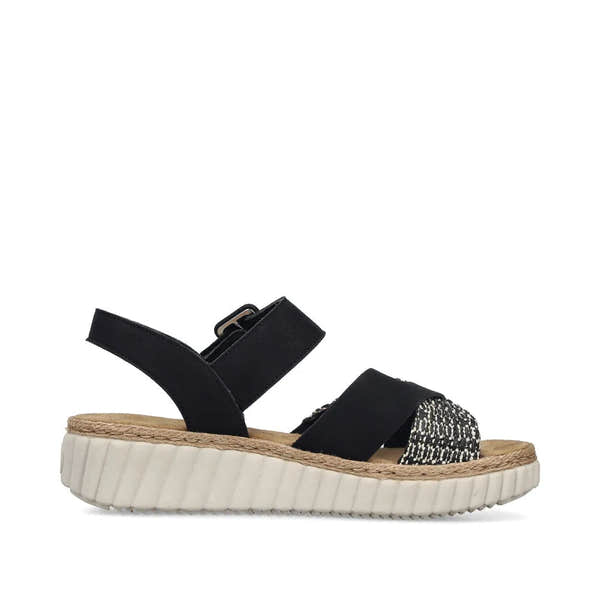 Rieker 69269-00 women's wide black touch fastening sandals with textured front strap and chunky white sole.