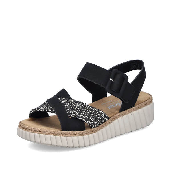 Rieker 69269-00 women's wide black touch fastening sandals with patterned and solid straps, cushioned insole, and textured white sole.