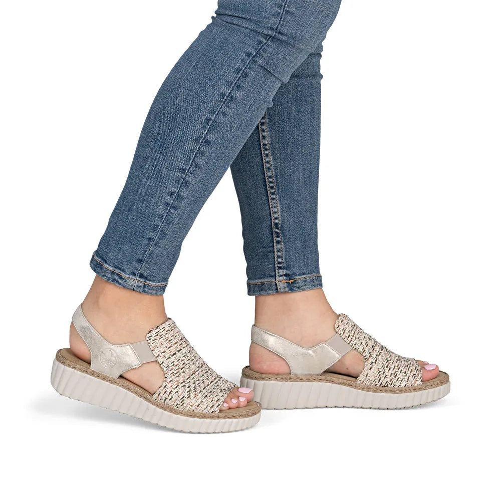Rieker 69276-60 Ladies Wide Beige Textile Elasticated Sandals with chunky white soles.