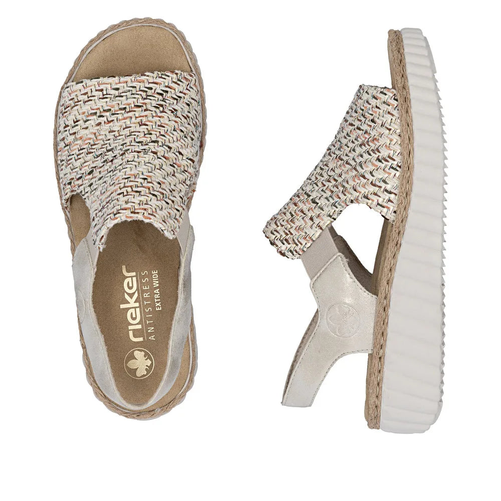 Rieker 69276-60 ladies wide beige textile elasticated sandals with woven strap and thick white sole.