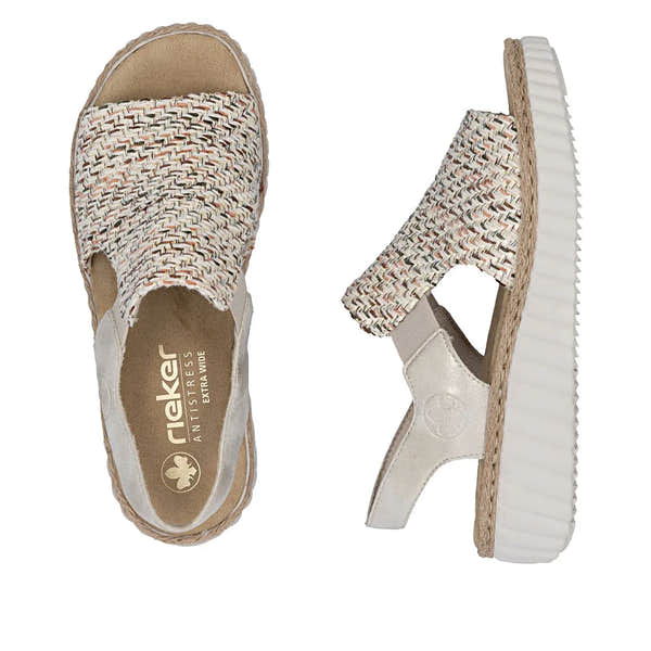 Rieker 69276-60 ladies wide beige textile elasticated sandals with woven strap and thick white sole.