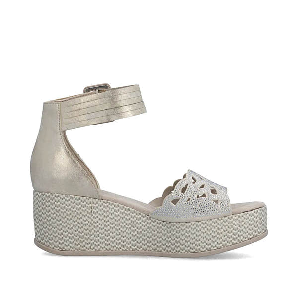 Rieker 69457-60 beige women's wedge sandals with buckle ankle strap and decorative cutout detail.