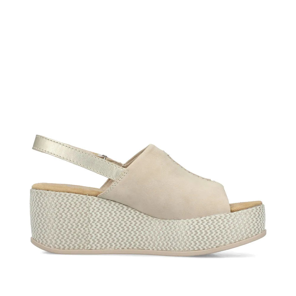 Rieker 69460-62 women's beige and pale gold sling back platform sandals with a textured wedge sole.