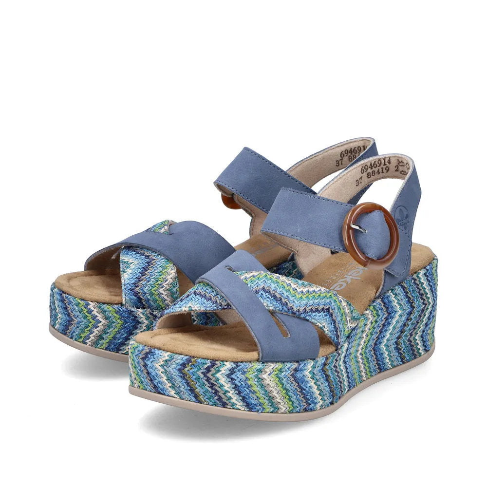 Rieker 69469-14 Women's navy touch fastening wedge sandals with colorful zigzag patterned platform and buckle strap.