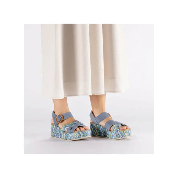 Rieker 69469-14 navy touch fastening ladies' platform wedge sandals with colorful zigzag patterned soles.