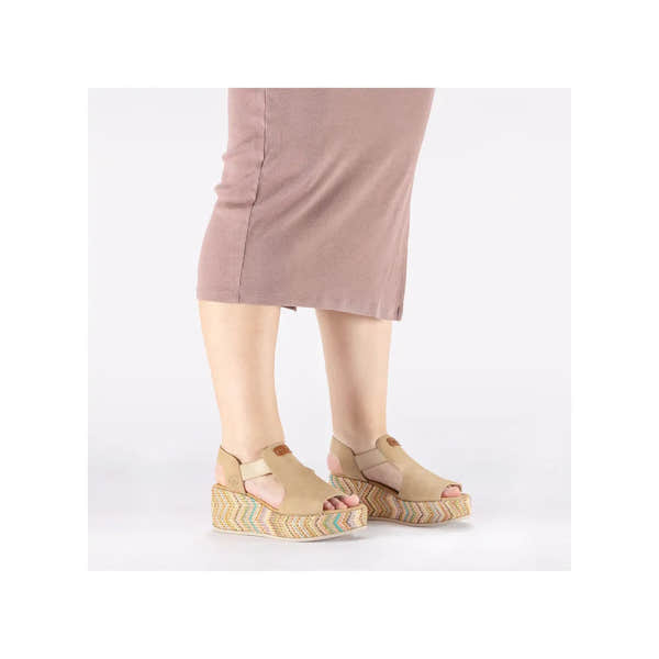 Rieker 69472-60 beige ladies elasticated wedge sandals with colorful woven platform soles.