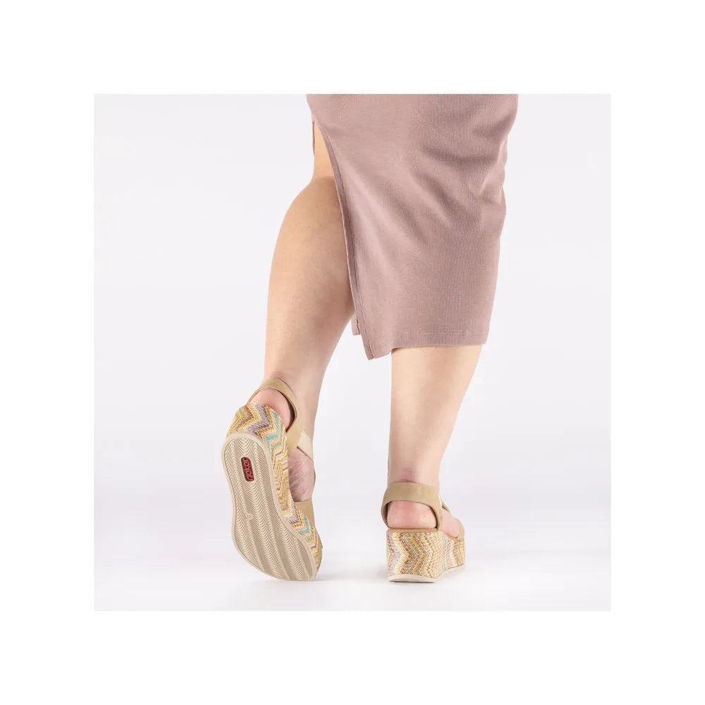 Rieker 69472-60 women's beige elasticated sandals with colorful woven platforms and ankle straps.