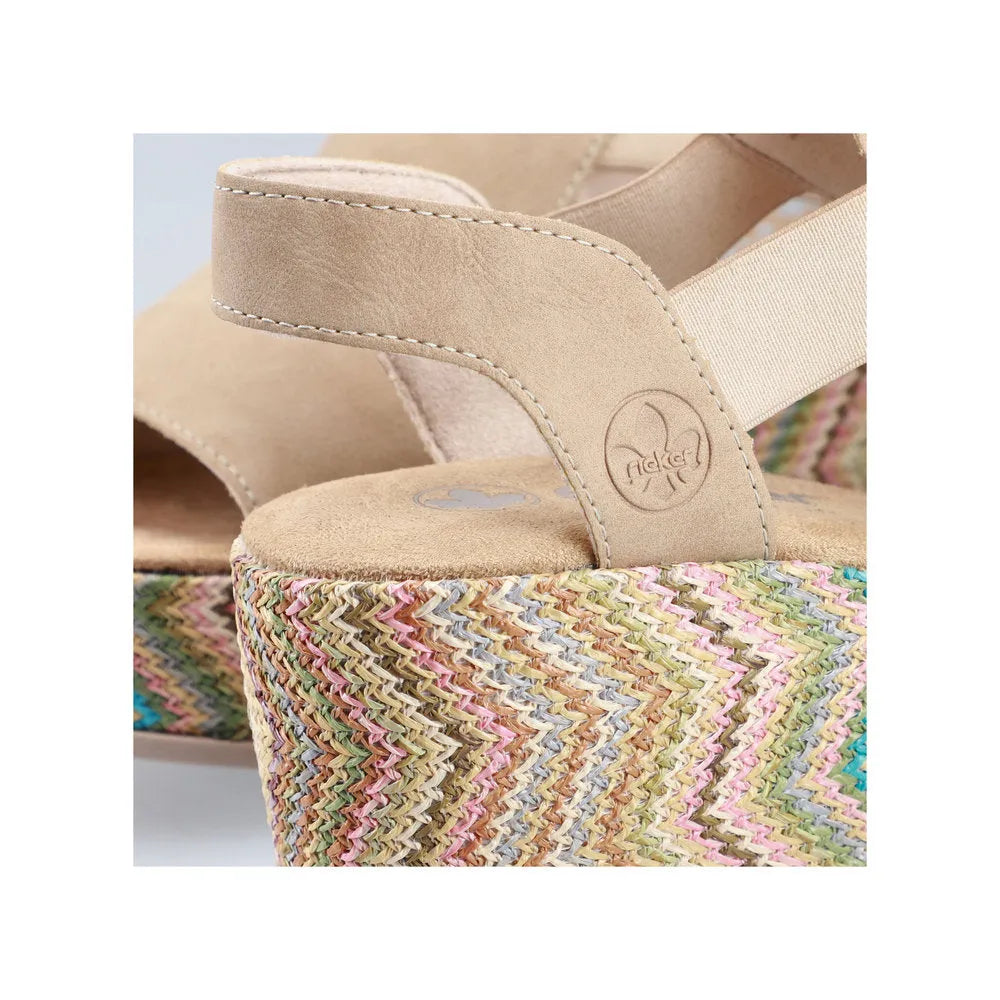 Rieker 69472-60 women's beige elasticated wedge sandals with woven multicolor platform for summer wear.