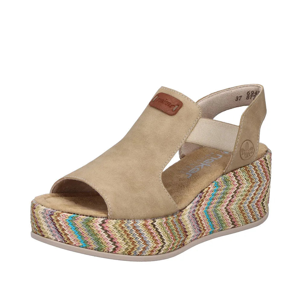 Rieker 69472-60 women's beige elasticated platform sandals with colorful woven wedge heel and open toe.