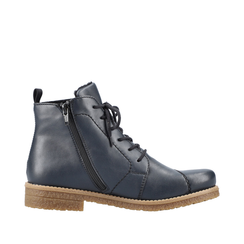 Rieker 73500-14 women's blue ankle boots with lace-up front, side zipper, and beige rubber sole.