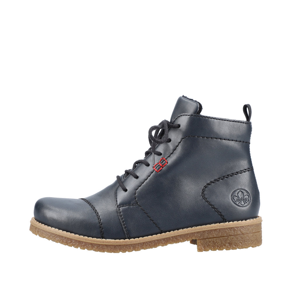 Rieker 73500-14 women's blue ankle boots with lace-up, zip closure, leather upper, and tan rubber sole.