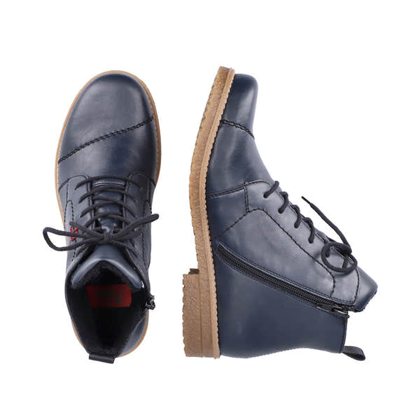 Rieker 73500-14 women's navy blue zip and lace ankle boots with tan sole, leather upper, and side zipper detail.
