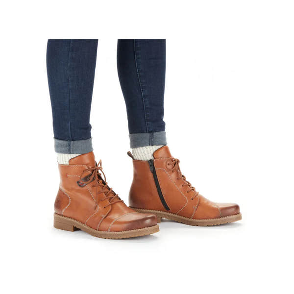 Rieker 73501-24 ladies brown ankle boots with zip and lace fastening, stacked heel, and rugged sole.