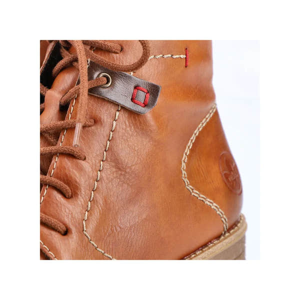 Rieker 73501-24 women's brown ankle boots with zipper, lace-up detail, and stitched leather design.