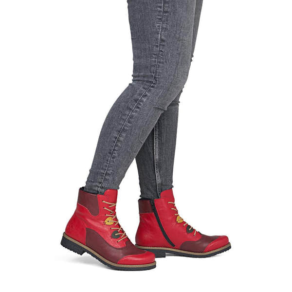 Rieker 73510-33 women's red/brown lace up mid-calf boots, on-foot lifestyle view.