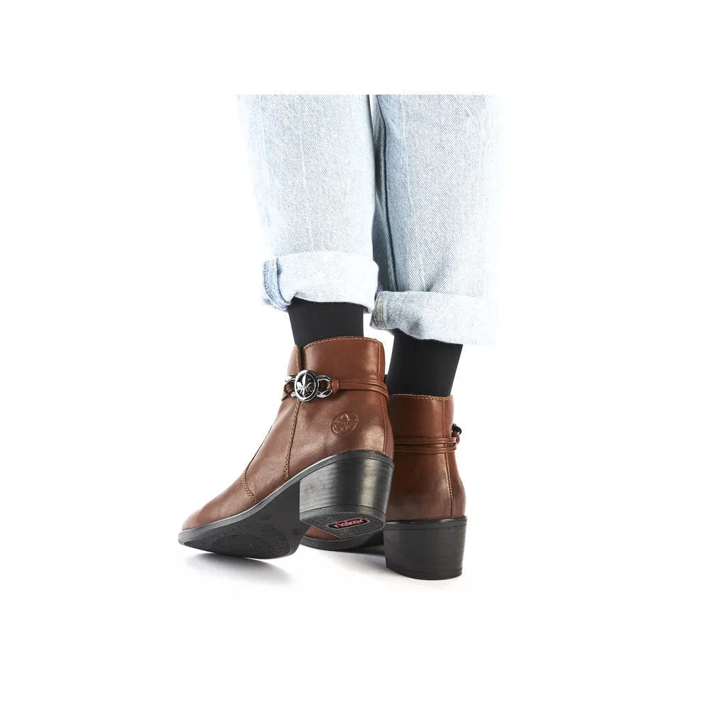 Rieker 73970-22 women's brown ankle boots with side zippers, chunky heel, and stylish design.