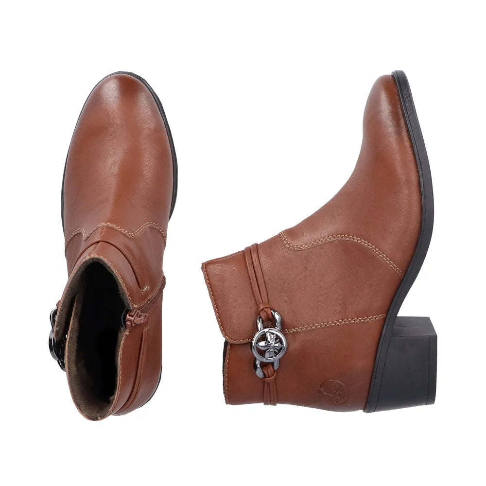 Rieker 73970-22 women's brown side-zip ankle boots with decorative strap and low block heel.