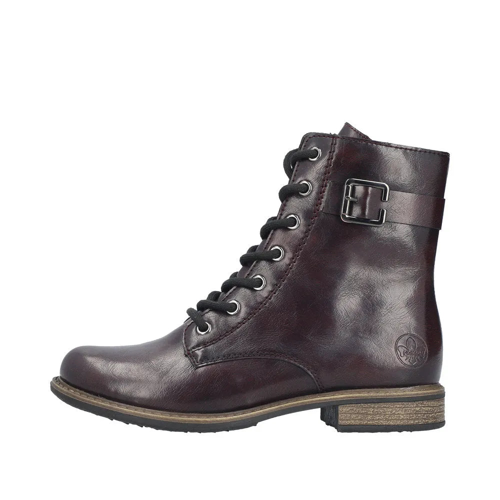 Rieker 74802-35 women's red leather ankle boots with lace-up, side zip, and buckle details, stylish and comfortable footwear.