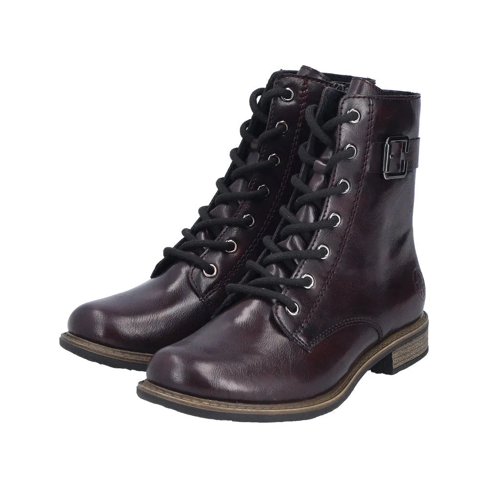Rieker 74802-35 women's red ankle boots with lace and zip closure, comb detail, and low heel.