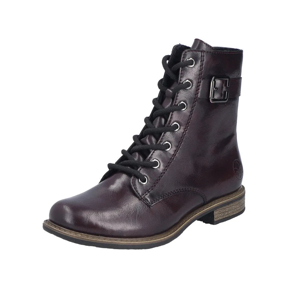 Rieker 74802-35 women's red leather ankle boot with zip and lace-up front, buckle detail, and low heel.