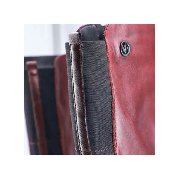 Rieker 77684-35 women's red leather knee-high boots with side zipper and black elastic panel.