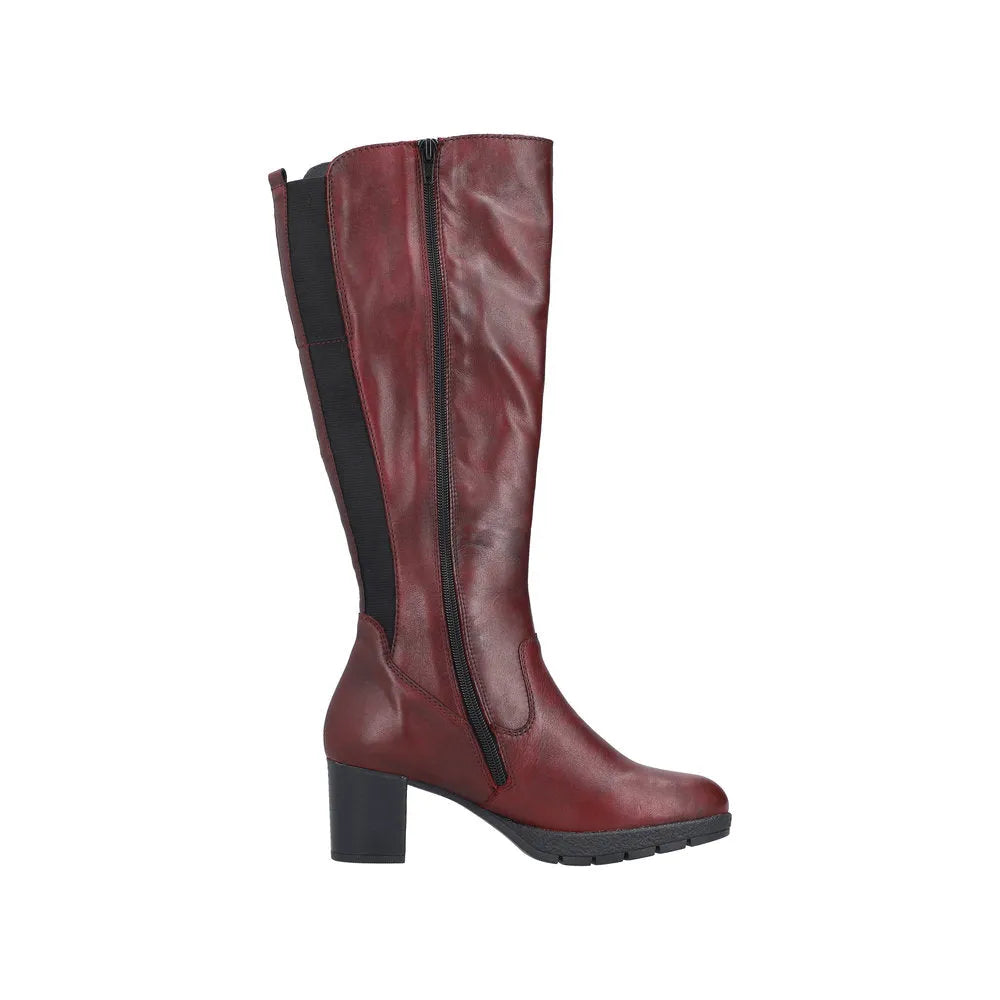 Rieker 77684-35 women's red leather knee-high boots with side zipper, chunky heel, and black elastic side panel.