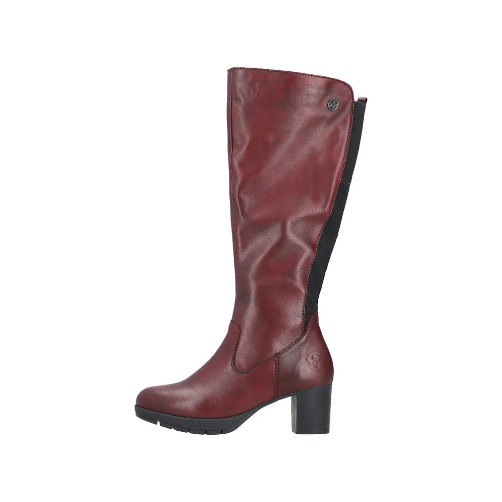 Rieker 77684-35 women's red leather knee-high boots with side zip and chunky heel.