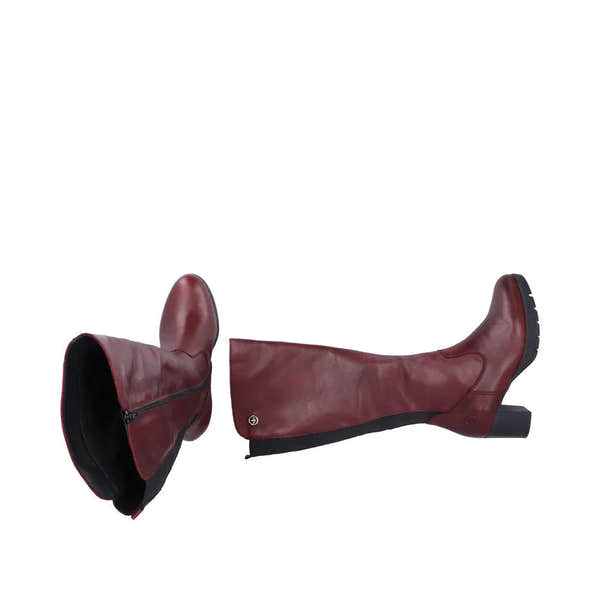 Rieker 77684-35 women's red leather knee-high boots with side zipper, low block heel, and rugged sole.