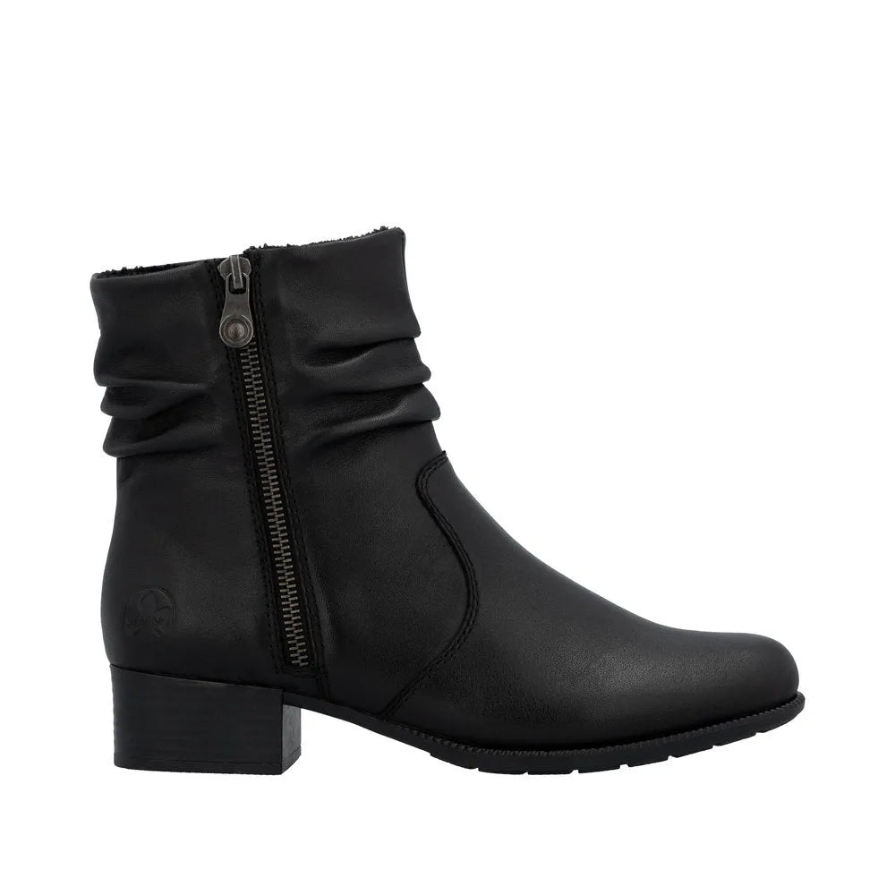 Rieker 78656-00 women's black leather ankle boots with twin zippers, low block heel, and slouchy design.