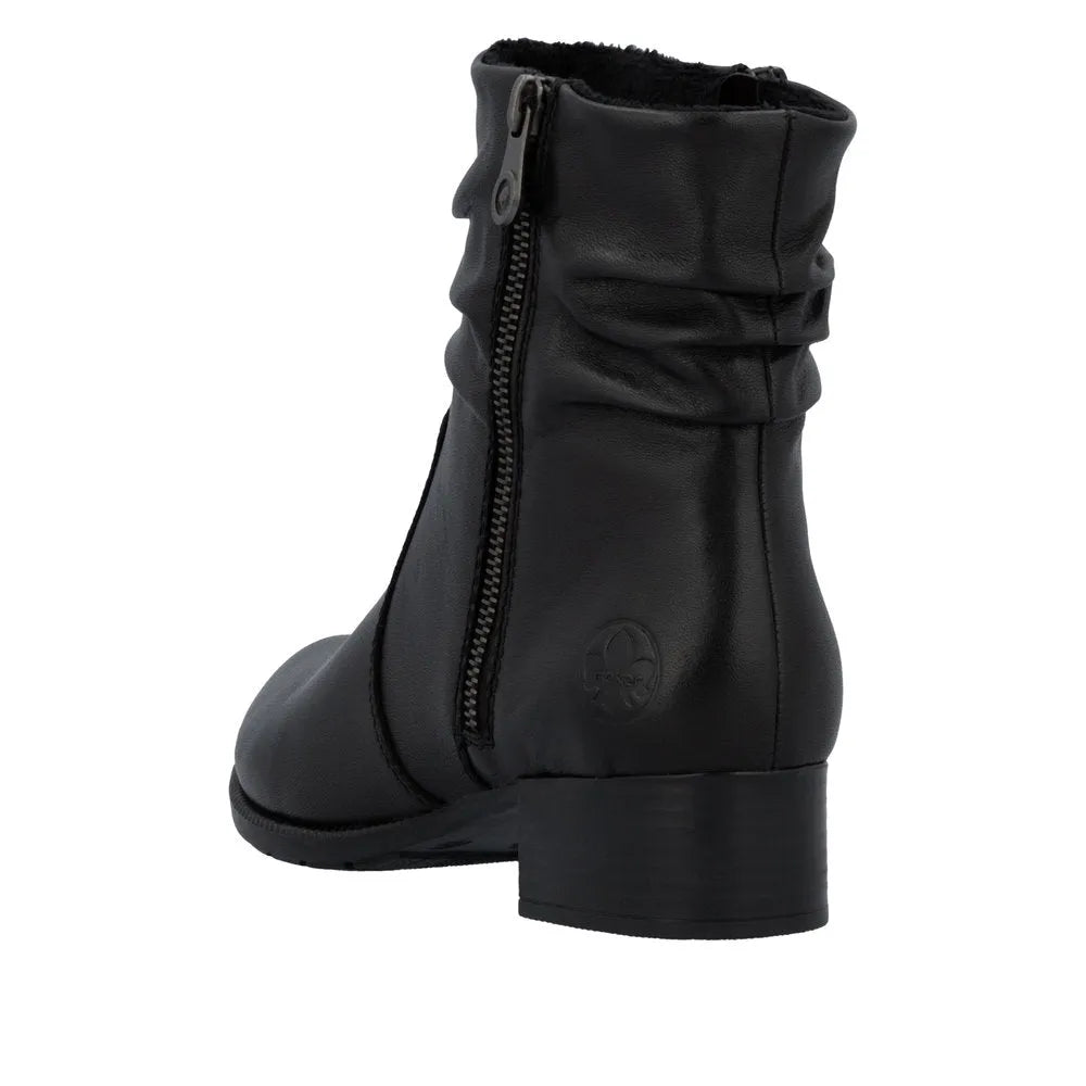 Rieker 78656-00 women's black leather ankle boots with twin zippers and block heel.