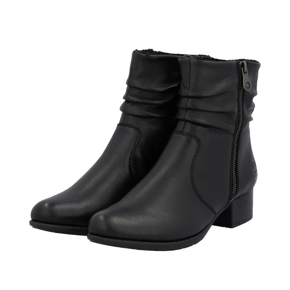 Rieker 78656-00 women's black leather ankle boots with twin zippers and low block heel. Stylish, everyday footwear with a ruched ankle design.